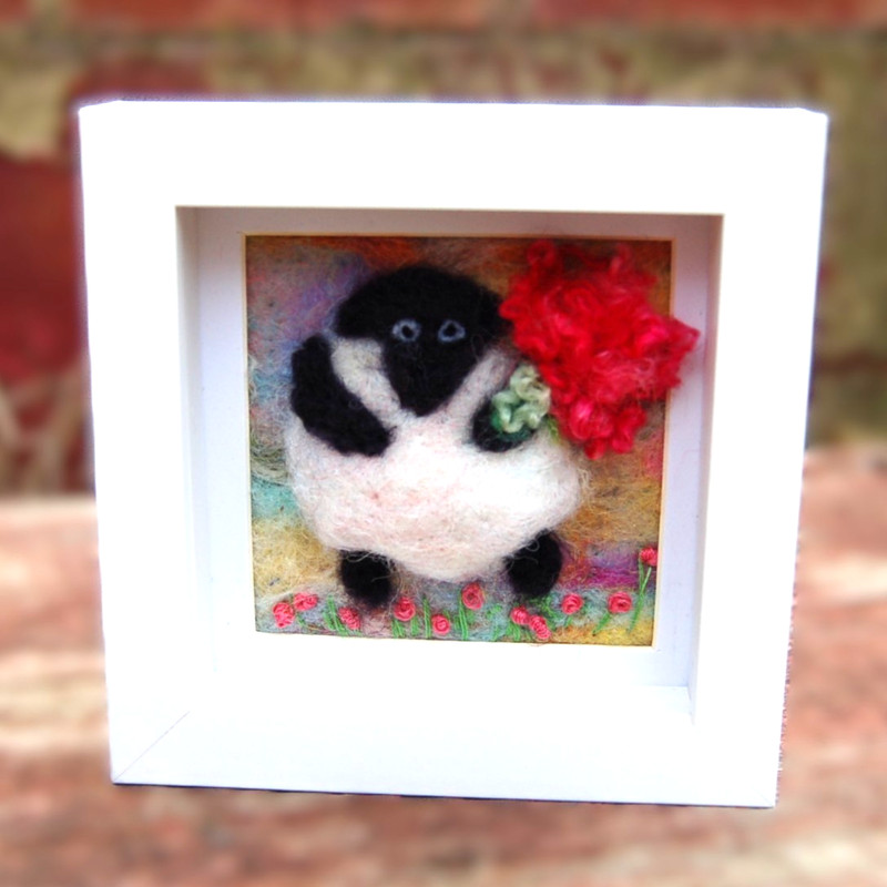Sheep holding flowers, textile art, fibre art