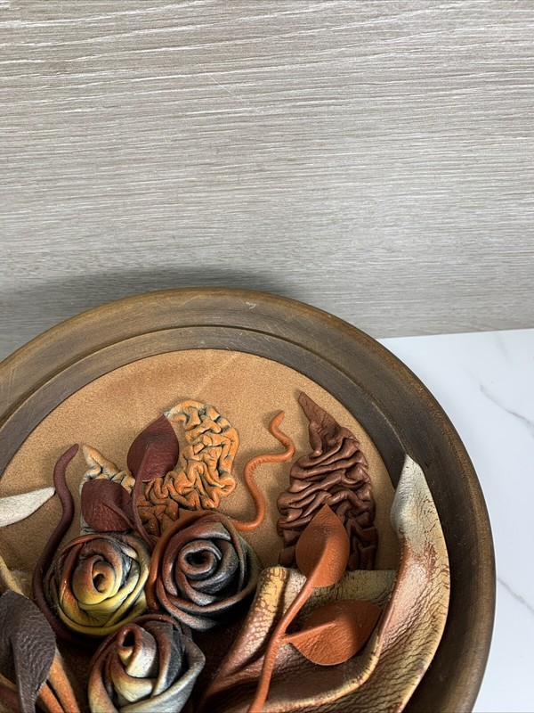 Tooled Leather Flowers Sculpture Art Wooden Wall Plate Vintage 9” Diameter gallery