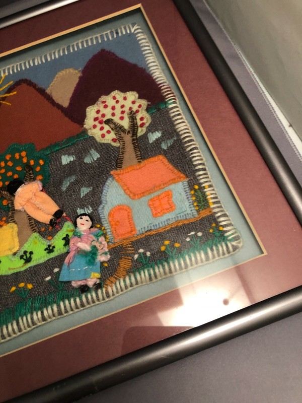 Framed vintage Embroidery & Appliqued Folk Art figural scene with house . gallery