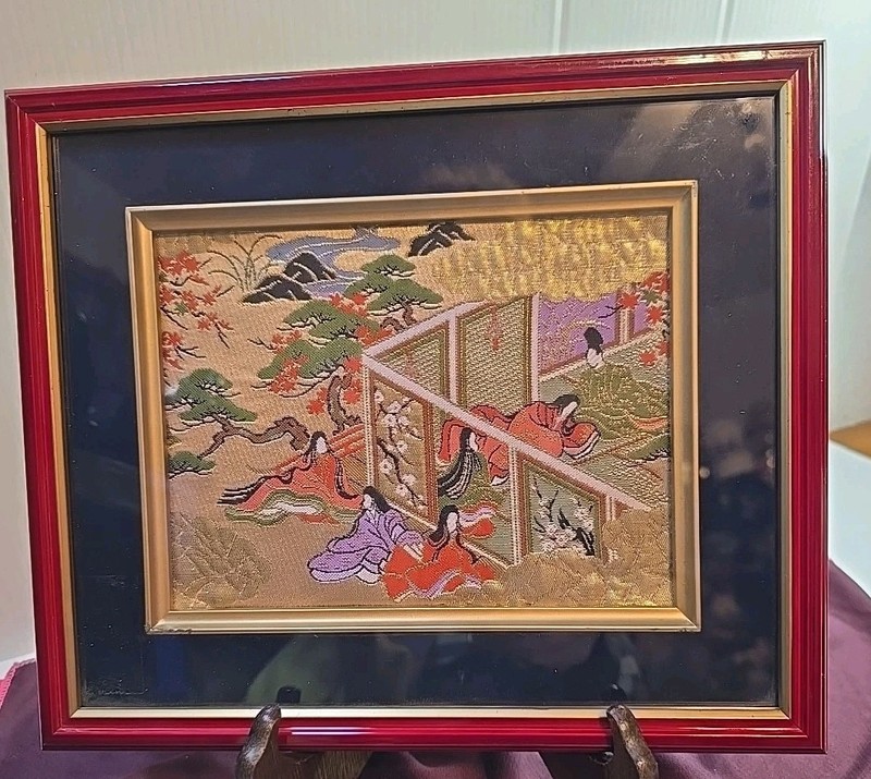JAPANEESE SILK THREAD PHOTO IN RED FRAME FRAME DEPICTING GEISHA RELAXING