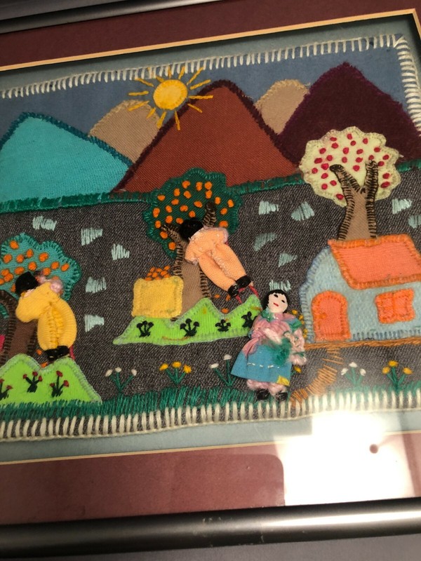 Framed vintage Embroidery & Appliqued Folk Art figural scene with house . gallery